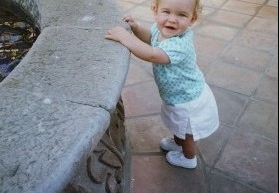 abi at the fountain.. just learning to walk